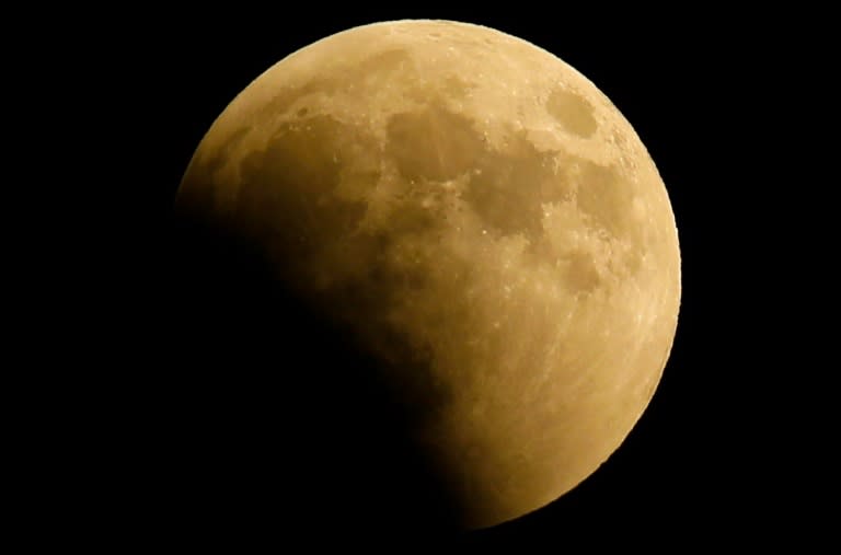 This picture shows Friday's lunar eclipse in the sky over Gaza City