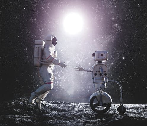 <span class="caption">Various types of astronaut assistant are in development.</span> <span class="attribution"><a class="link " href="https://www.shutterstock.com/image-illustration/astronaut-robot-artificial-intelligence-handshake-on-1424259551" rel="nofollow noopener" target="_blank" data-ylk="slk:Michal Bednarek/shutterstock.com;elm:context_link;itc:0;sec:content-canvas">Michal Bednarek/shutterstock.com</a></span>