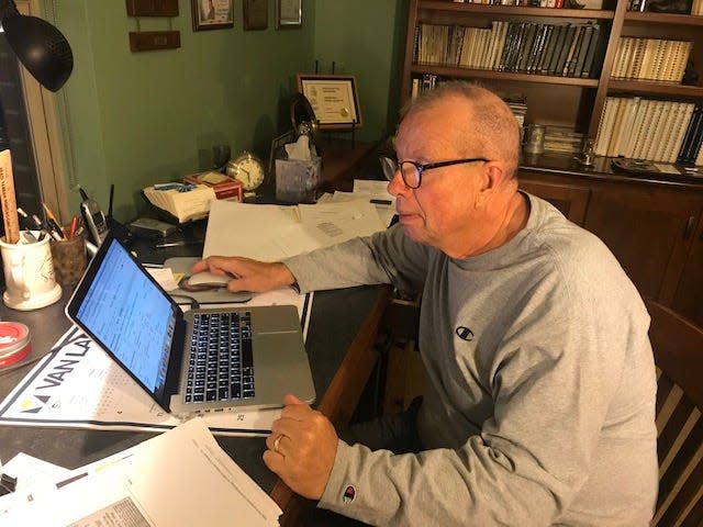 Cliff Christl, the Packers team historian, works in his home office in Green Bay.