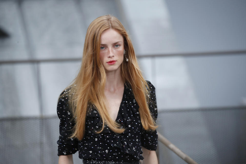 A model wears a creation as part of the Chanel Ready To Wear Spring-Summer 2020 collection, unveiled during the fashion week, in Paris, Tuesday, Oct. 1, 2019. (AP Photo/Francois Mori)