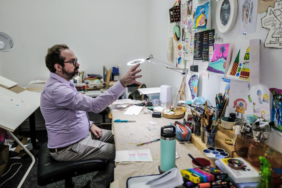 Artist Daniel J. Hogan in his workspace, talks about his inspiration wall Tuesday, May 10, 2022.