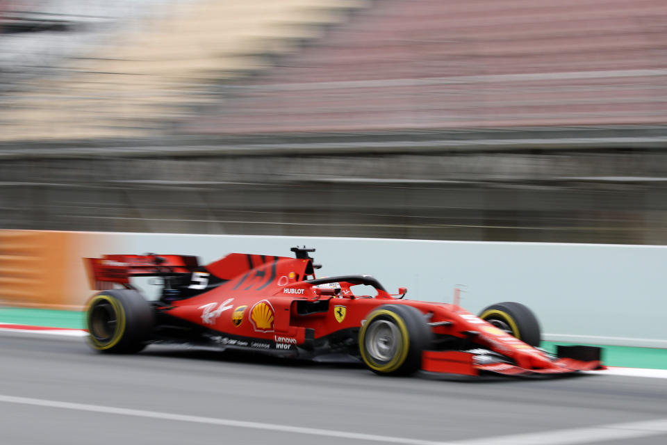 Ferrari driver Sebastian Vettel of Germany steers his car, during a Formula One pre-season testing session at the Barcelona Catalunya racetrack in Montmelo, outside Barcelona, Spain, Wednesday, Feb.20, 2019. (AP Photo/Joan Monfort)