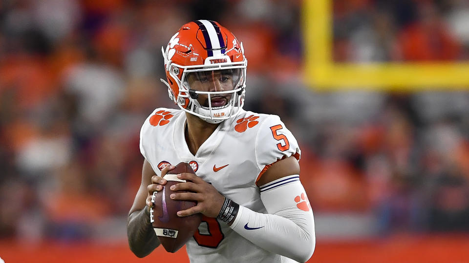 Clemson quarterback DJ Uiagalelei looks to pass during the first half of an NCAA college football game against Syracuse in Syracuse, N.Y., Friday, Oct. 15, 2021. (AP Photo/Adrian Kraus)