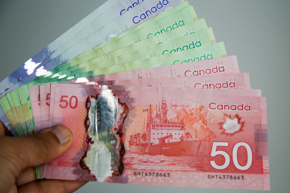 In this photo illustration, five, twenty and fifty Canadian dollar banknotes. (Photo Illustration by Dinendra Haria/SOPA Images/LightRocket via Getty Images)