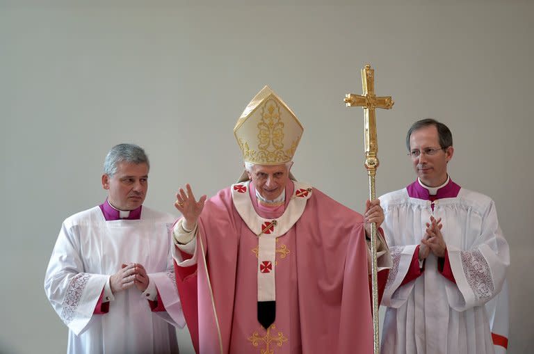 Pope Benedict XVI celebrates mass on December 16, 2012 during a visit to the San Patrizio al Colle Prenestino parish on the outskirts of Rome. The pope has weighed in on a heated debate over gay marriage, criticising new concepts of the traditional family and warning that in the fight for the family, mankind itself is at stake