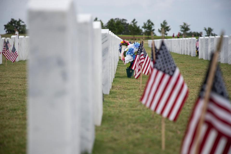 Flags were placed in front of each tombstone at the Tallahassee National Cemetery to honor the fallen during on Memorial Day, Monday, May 25, 2020. 