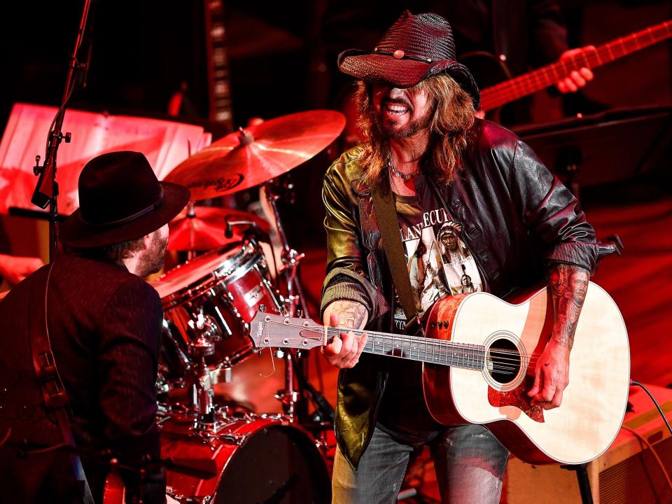 Billy Ray Cyrus performs "Achy Breaky Heart" during the NSAI 50 Years of Songs concert at the Ryman Auditorium in Nashville, Tenn., Wednesday, Sept. 20, 2017.