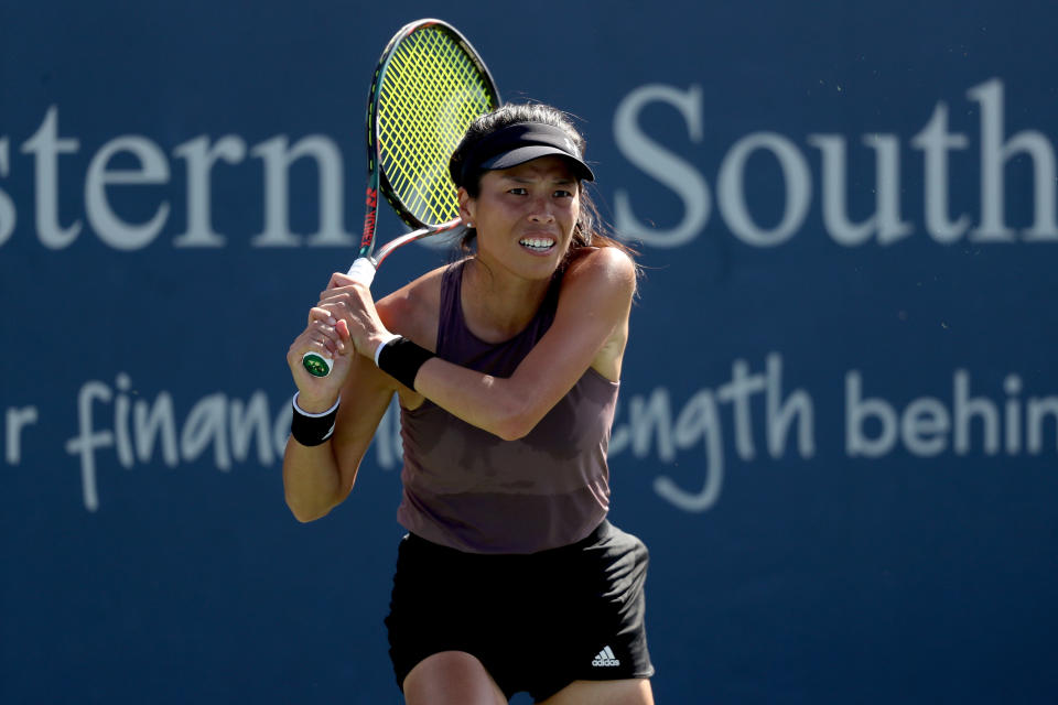 MASON, OHIO - AUGUST 15: Su-Wei Hsieh of Chinese Taipei  returns a shot to Naomi Osaka of Japan during the Western & Southern Open at Lindner Family Tennis Center on August 15, 2019 in Mason, Ohio. (Photo by Matthew Stockman/Getty Images)