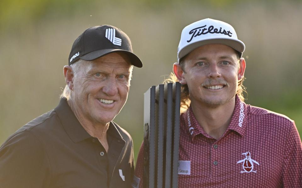 Team Captain Cameron Smith of Punch GC poses with Greg Norman, CEO and commissioner of LIV Golf, after winning the individual title during Day Three of the LIV Golf Invitational - Chicago at Rich Harvest Farms on September 18, 2022 in Sugar Grove, Illinois - Getty Images North America 