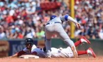 Jul 15, 2018; Boston, MA, USA; Boston Red Sox right fielder Mookie Betts (50) steals second base past the tag of Toronto Blue Jays shortstop Aledmys Diaz (1) during the seventh inning at Fenway Park. Mandatory Credit: Bob DeChiara-USA TODAY Sports