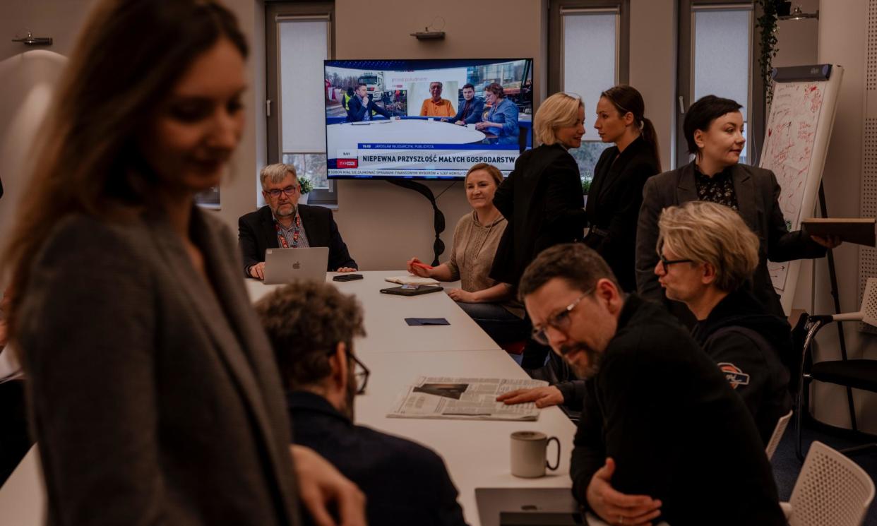 <span>A morning conference of directors and journalists from TVP Info working on the 19.30 bulletin.</span><span>Photograph: Kasia Stręk/The Guardian</span>