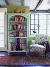 <p>Here's some motivation to finally declutter your bookshelf. A floor-to-ceiling display definitely wows more than a pile of old paperbacks. </p><p>Get the tutorial at<em> <a href="https://www.countryliving.com/diy-crafts/g1350/pumpkin-decorating-1009/?slide=92" rel="nofollow noopener" target="_blank" data-ylk="slk:Country Living;elm:context_link;itc:0;sec:content-canvas" class="link ">Country Living</a>.</em></p>