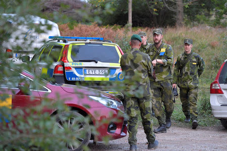 A passenger train collided with a tank and derailed, where the Swedish Military exercise Aurora 17 is taking place, near Trosa, south of Stockholm, Sweden, September 26, 2017. TT News Agency via REUTERS ATTENTION EDITORS - THIS IMAGE WAS PROVIDED BY A THIRD PARTY. SWEDEN OUT. NO COMMERCIAL OR EDITORIAL SALES IN SWEDEN. NO COMMERCIAL SALES.