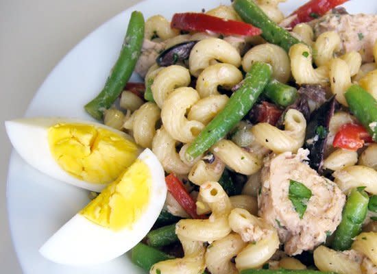 <strong>Get the <a href="http://www.gastronomersguide.com/2009/03/pasta-salad-nicoise.html" target="_hplink">Pasta Salad NIcoise recipe from Gastronomer's Guide</a></strong>    In this recipe, American pasta salad and French tuna Nicoise meet. Blanched green beans, bell pepper, olives, capers and olive oil-packed tuna combine to create this main course dish. Serve with hard-boiled eggs.
