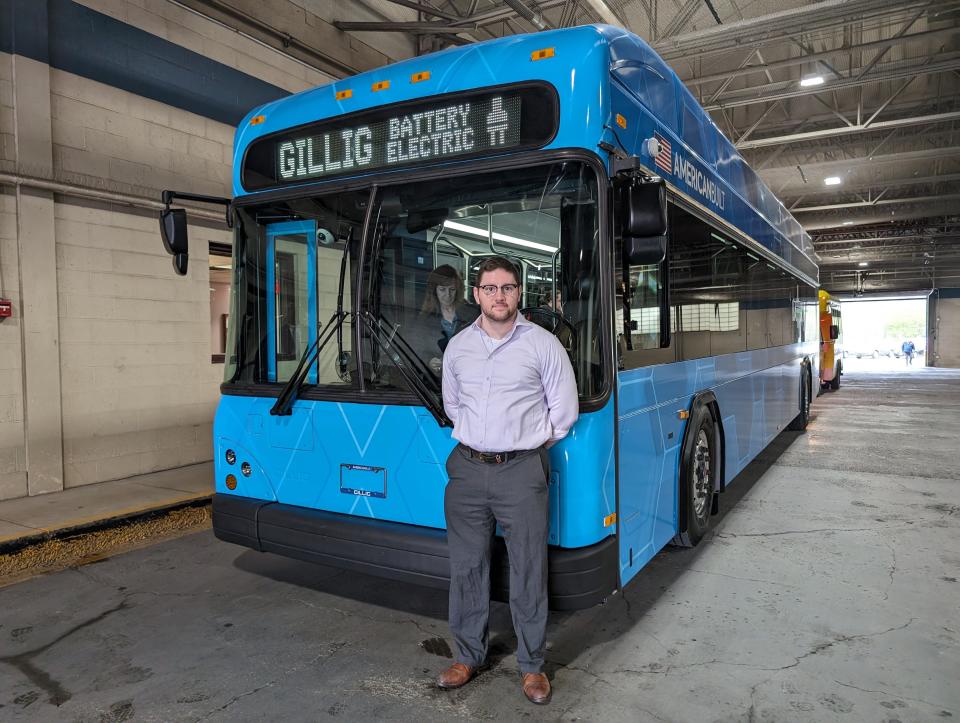 TCAT's newly hired GM, Matthew Rosenbloom-Jones, in front of a Gillig electric bus as Agnes Beck, a longtime driver with the organization, gets ready for a test drive April 24, 2024.