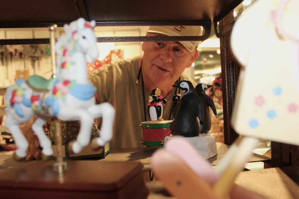 At MCF Treasure Trove Market, Terry Braden of Monroe is the owner of Kaleidoscope Resale, a booth specializing in vintage items like music boxes.