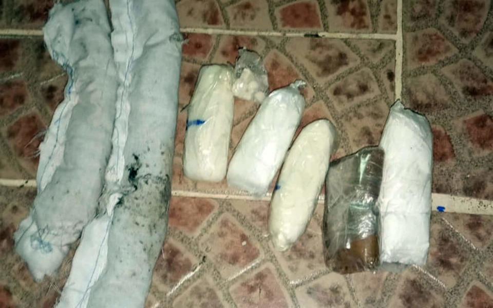 A selection of packages found tied to the cat's body - Panama's Prosecutor Office/AFP