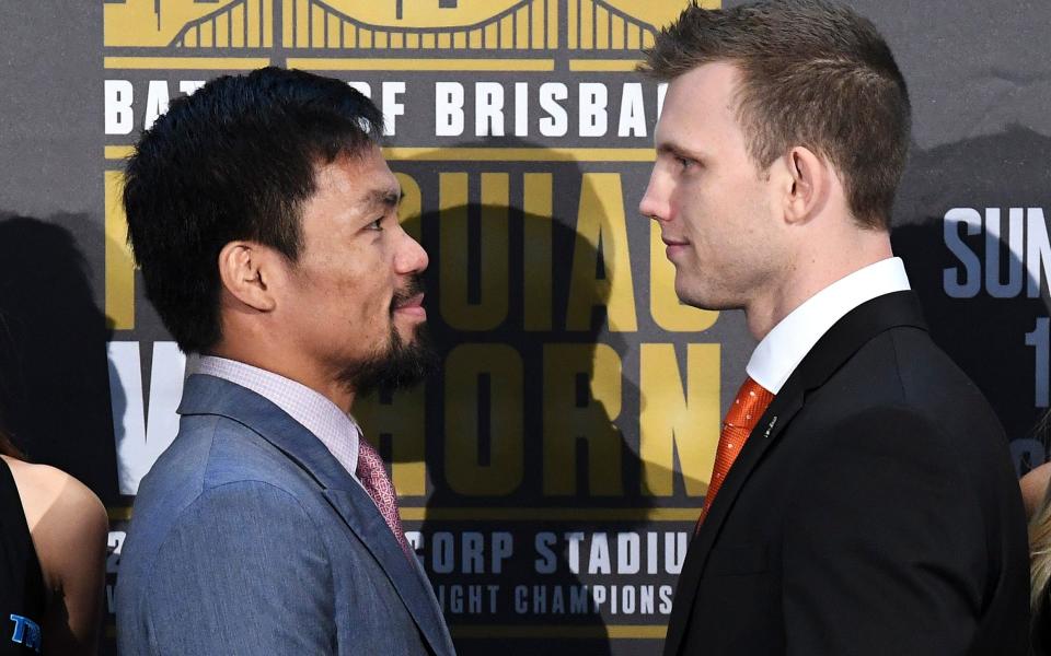 Boxers Manny Pacquiao of the Philippines and Australia's Jeff Horn stand together following their official news conference ahead of their WBO welterweight fight in Brisbane. (Reuters)