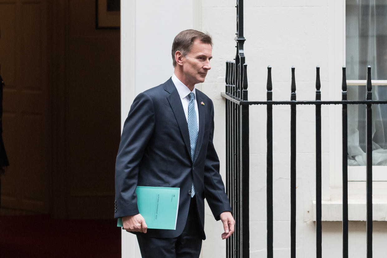 LONDON, UNITED KINGDOM - NOVEMBER 17, 2022: Chancellor of the Exchequer Jeremy Hunt leaves 11 Downing Street ahead of the announcement of the Autumn Statement in the House of Commons in London, United Kingdom on November 17, 2022. The Chancellor's tax and spending plans in the 2022 Autumn Statement are expected to be focused on increasing taxes and cutting spending to fix the public finances amid cost of living crisis and inflation reaching 11.1 % in October. (Photo credit should read Wiktor Szymanowicz/Future Publishing via Getty Images)