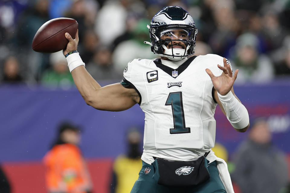 Philadelphia Eagles quarterback Jalen Hurts (1) passes against the New York Giants during the first quarter of an NFL football game, Sunday, Jan. 7, 2024, in East Rutherford, N.J. (AP Photo/Adam Hunger)