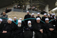 Druze people take part in a rally over U.S. President Donald Trump's support for Israeli sovereignty over the Golan Heights, in Majdal Shams near the ceasefire line between Israel and Syria in the Israeli occupied Golan Heights March 23, 2019 REUTERS/Ammar Awad