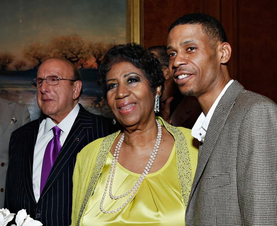 aretha franklin and kecalf franklin smiling and embracing for a photo