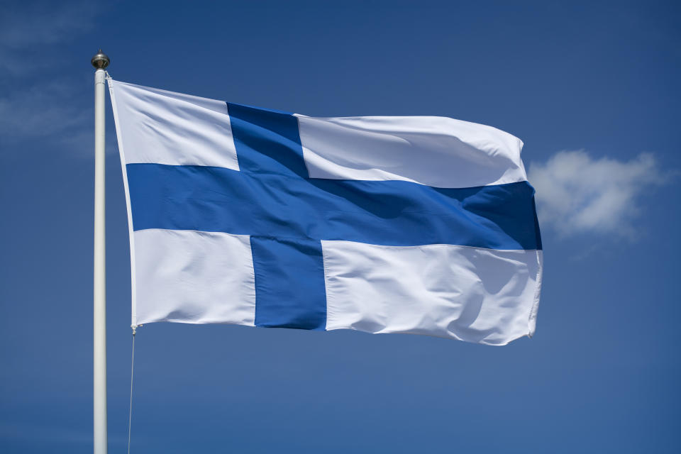 Finnish flag waving in the wind.