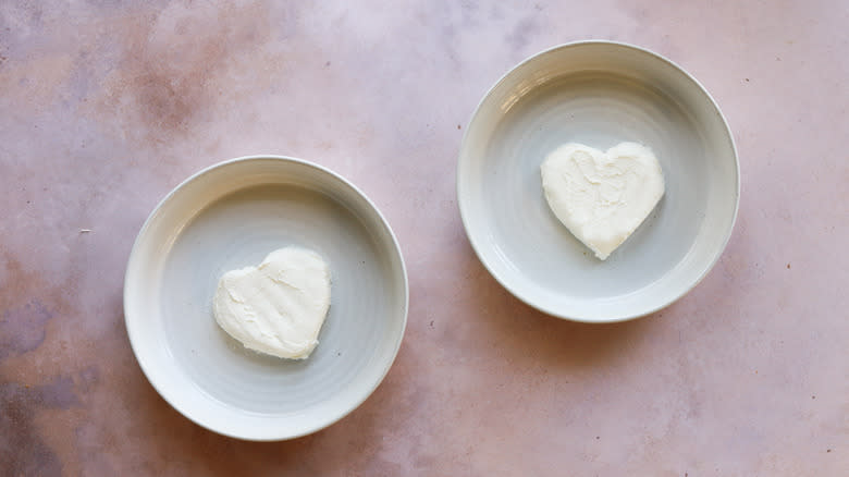 Two plates with cheese hearts