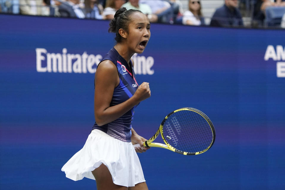 Leylah Fernandez, of Canada, reacts after scoring a point against Emma Raducanu, of Britain, during the women's singles final of the US Open tennis championships, Saturday, Sept. 11, 2021, in New York. (AP Photo/Elise Amendola)