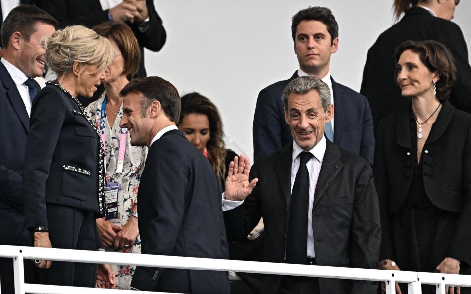 Seen at the opening ceremony of the Games were Brigitte and Emmanuel Macron, former president Nicolas Sarkozy (centre front), prime minister Gabriel Attal (centre back) and sports minister Amélie Oudéa-Castéra