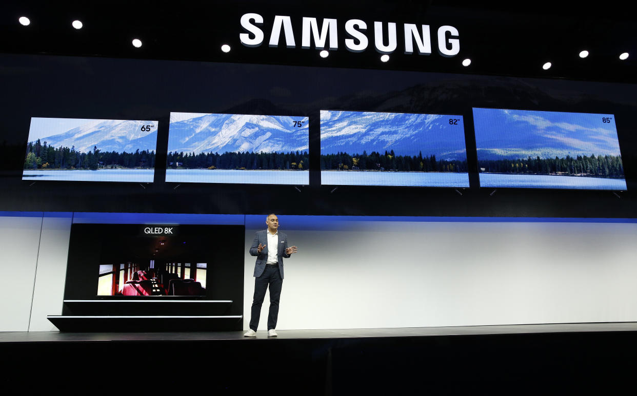 Dave Das, senior vice president, Samsung Electronics America, unveils the 98" QLED 8K TV during a Samsung news conference at CES International, Monday, Jan. 7, 2019, in Las Vegas. (AP Photo/John Locher)