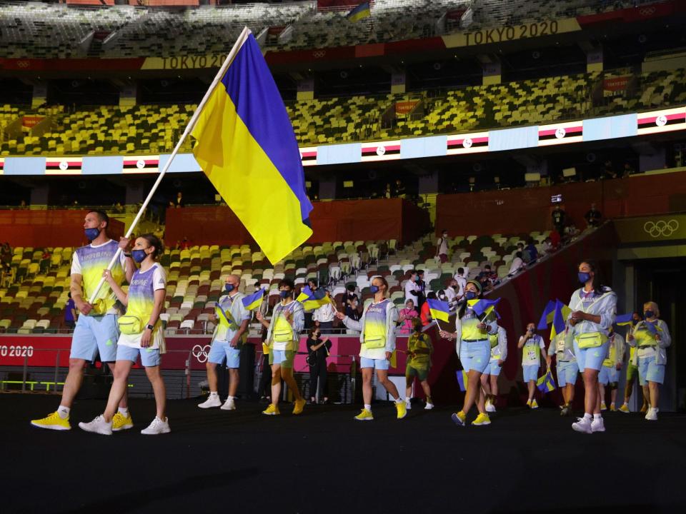 Athletes from Ukraine make their entrance at the Summer Olympics.