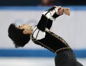 Michael Christian Martinez of the Philippines competes in the men's short program figure skating competition at the Iceberg Skating Palace during the 2014 Winter Olympics, Thursday, Feb. 13, 2014, in Sochi, Russia. (AP Photo/Ivan Sekretarev)