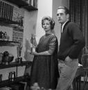 Academy Award–winning duo Paul Newman and Joanne Woodward opened their home to cameras on several occasions throughout their 50 years of marriage. Pictured here, the two hosted journalist Edward Murrow for his <em>Person to Person</em> celebrity interview show in their 11th Street abode in New York’s Greenwich Village. The actors’ Beverly Hills <a href="https://www.architecturaldigest.com/story/paul-newman-and-joanne-woodwards-former-beverly-hills-home-lists?mbid=synd_yahoo_rss" rel="nofollow noopener" target="_blank" data-ylk="slk:rental;elm:context_link;itc:0;sec:content-canvas" class="link ">rental</a>, a Colonial Revival–style four-bedroom, made a cozy set for a <em>New York Daily News</em> photo shoot in 1962.