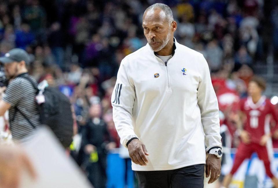 Acting Kansas head coach Norm Roberts walks off the court after losing 72-71 to Arkansas in a second-round college basketball game in the NCAA Tournament Saturday, March 18, 2023, in Des Moines, Iowa.