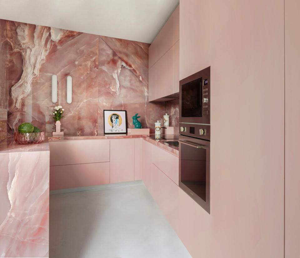 <p>If you’ve chosen a colour for your kitchen, why not go all in and apply it to worktops, walls and cupboards for maximum effect? In this bubblegum pink kitchen belonging to the owners of rug brand <a href="https://elledecoration.co.uk/houses/a35029955/cc-tapis-home-milan/" rel="nofollow noopener" target="_blank" data-ylk="slk:CC-Tapis;elm:context_link;itc:0;sec:content-canvas" class="link ">CC-Tapis</a>, pink onyx adds a luxe, grown-up twist and depth. For natural stone in an array of colours, try Antolini. <a href="https://www.antolini.com/en/" rel="nofollow noopener" target="_blank" data-ylk="slk:antolini.com;elm:context_link;itc:0;sec:content-canvas" class="link ">antolini.com</a></p>