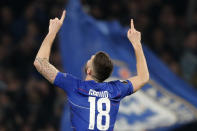 Chelsea's Oliver Giroud celebrates scoring his side's first goal during the round of 32, second leg, Europa League soccer match between Chelsea and Malmo FF at Stamford Bridge stadium in London, Thursday Feb. 21, 2019. (AP Photo/Frank Augstein)
