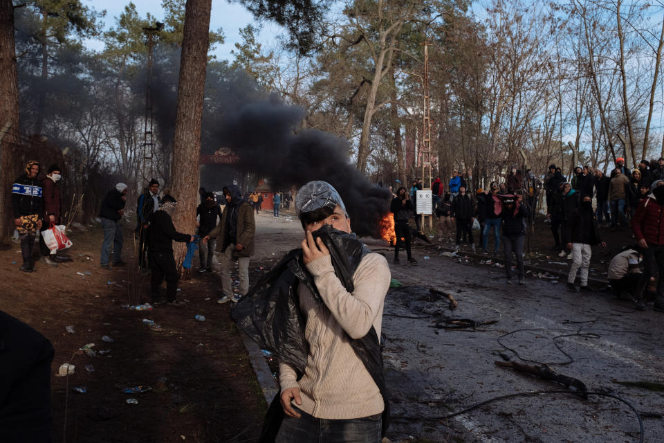 A clash with Greek police near the border. | Emin Ozmen—Magnum Photos for TIME