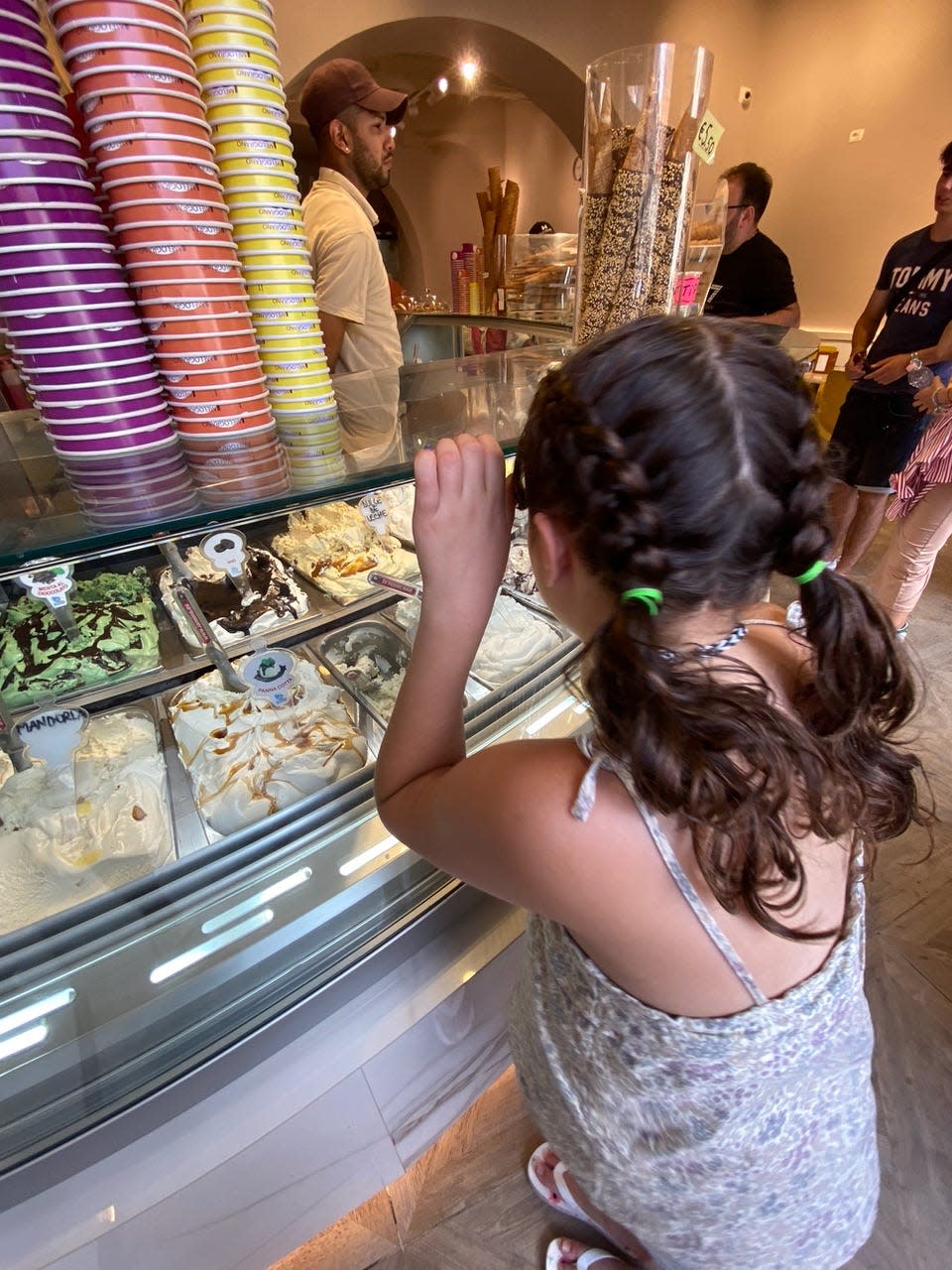 The author's daughter looking at a case of gelato.