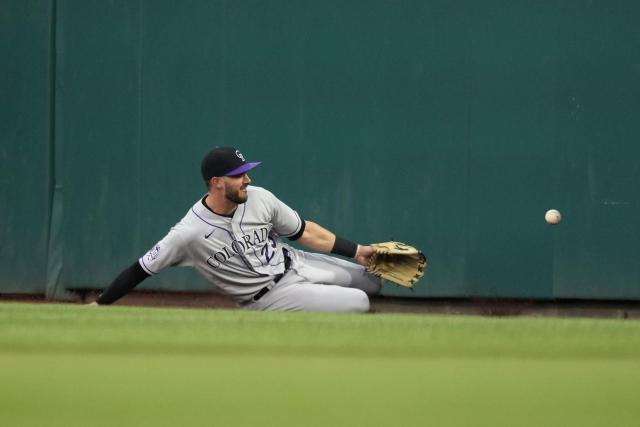 Rockies end eight-game skid by blanking Phillies