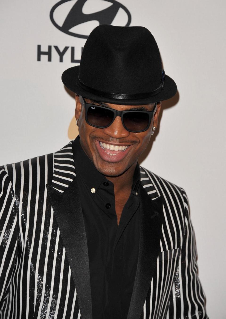 Recording artist Ne-Yo arrives at the Clive Davis Pre-GRAMMY Gala on Saturday, Feb. 9, 2013 in Beverly Hills, Calif. (Photo by John Shearer/Invision/AP)