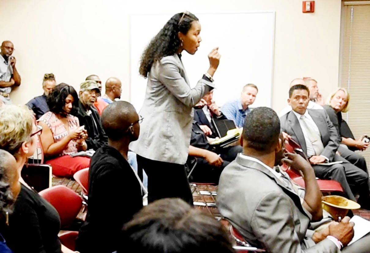 Omari Ho-Sang talks to city officials during the community meeting about the death of Anthony Childs on Tuesday, May 21, 2019 at the Shreve Memorial Library Wallette Branch.