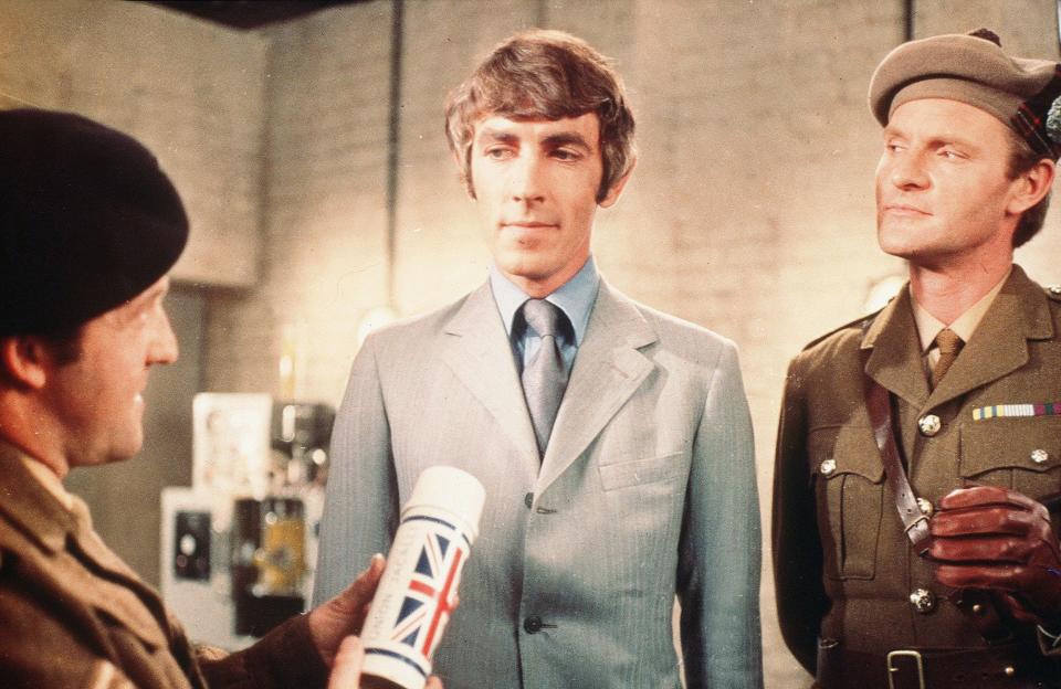 Norman Rossington, Peter Cook and Julian Glover in The Rise and Rise Of Michael Rimmer (1970) directed by Kevin Billington - David Paradine Prods/Kobal/Shutterstock 