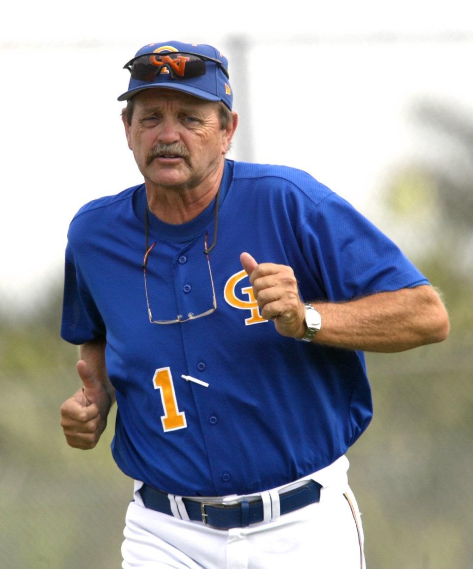 PAHOKEE; 4/12/05:  Cardinal Newman coach Jack Kokinda runs off the field from his positiona as third base coach Tuesday afternoon in Pahokee.  The game was  Kokinda 's 600th career win .    Photo by Lannis Waters/ The Palm Beach Post ..... NOT FOR DISTRIBUTION OUTSIDE COX PAPERS    OUT PALM BEACH,  BROWARD, MARTIN, ST. LUCIE, INDIAN RIVER AND OKEECHOBEE COUNTIES IN FLORIDA. ORLANDO OUT.  NO SALES. TV OUT. TABLOIDS OUT. MAGAZINES OUT. WIDE WORLD OUT. INTERNET USE OUT. ORG XMIT: MER0504122006582658 ORG XMIT: MER0705171807433204