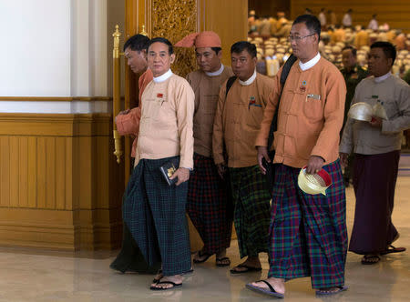 Win Myint, who recently resigned his post of speaker of the Lower House of Parliament, leaves the parliament, in Naypyitaw, Myanmar March 22, 2018. REUTERS/Stringer