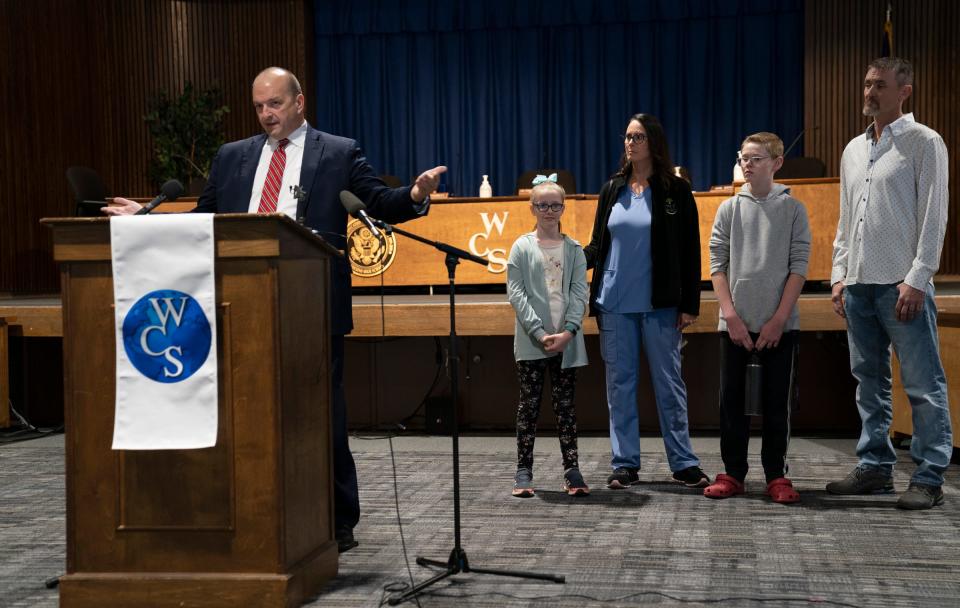 Warren Consolidated Schools Superintendent Robert Livernois holds a news conference Thursday, April 27, 2023, as Raelyn Reeves stands with her mom, Ireta Reeves, and her brother, Dillon Reeves, 13, a seventh grader at Carter Middle School in Warren, and father, Steve Reeves, at right. Dillon made a heroic move when he brought his school bus to a safe stop after the driver fell ill and unconscious this week.