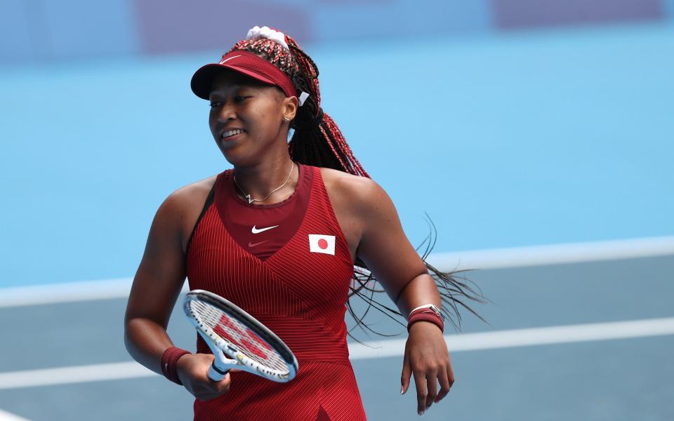 Naomi Oaska is looking happy and relaxed - GETTY IMAGES