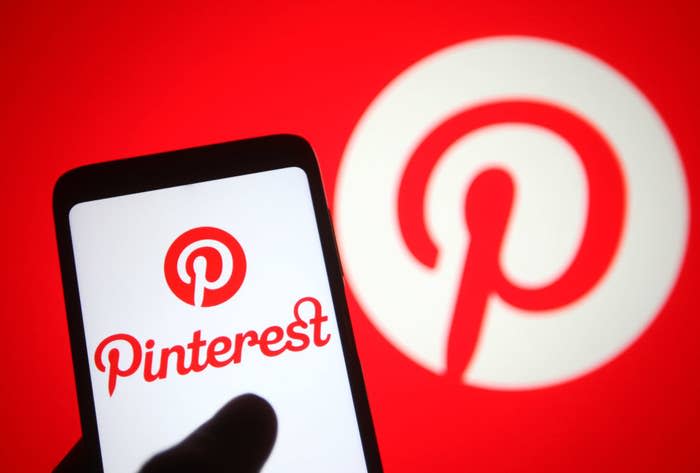 A phone open to the Pinterest app