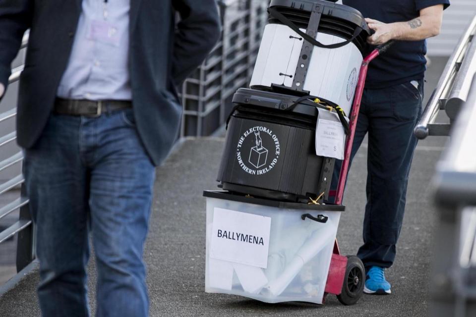 Petition boxes are collected from Seven Towers leisure centre in Ballymena on the final day of a recall petition (PA)