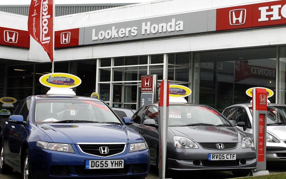The Society of Motor Manufacturers and Traders has reported falling sales of new cars since April  - PA
